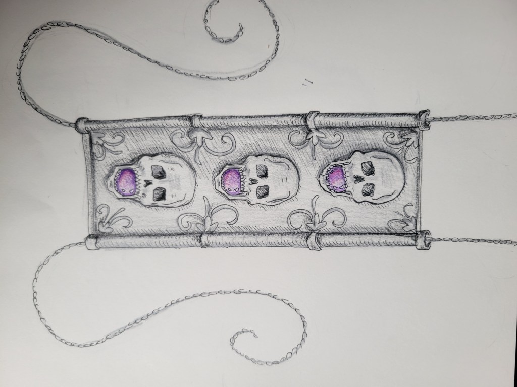 A hand drawn sketch by author and artist Samantha Breaux of the Necromancer's Yoke, a cursed necklace from her book Thief of Death. The necklace is a long, silver rectangle with three skulls in a column down the center. Each skull has a purple stone in its mouth. There is curling filigree around the edges of the necklace. 